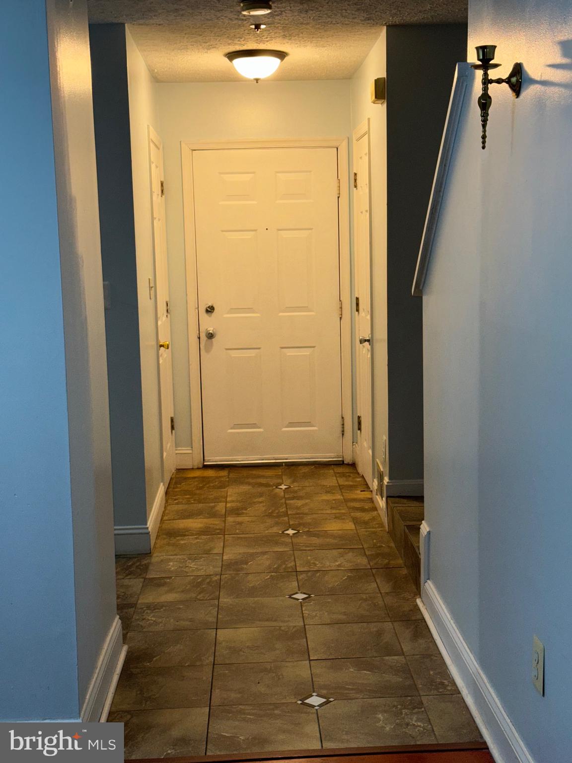 7148 Natures Road Columbia, MD 21046 - Photo 35 of 49 a view of hallway with stairs