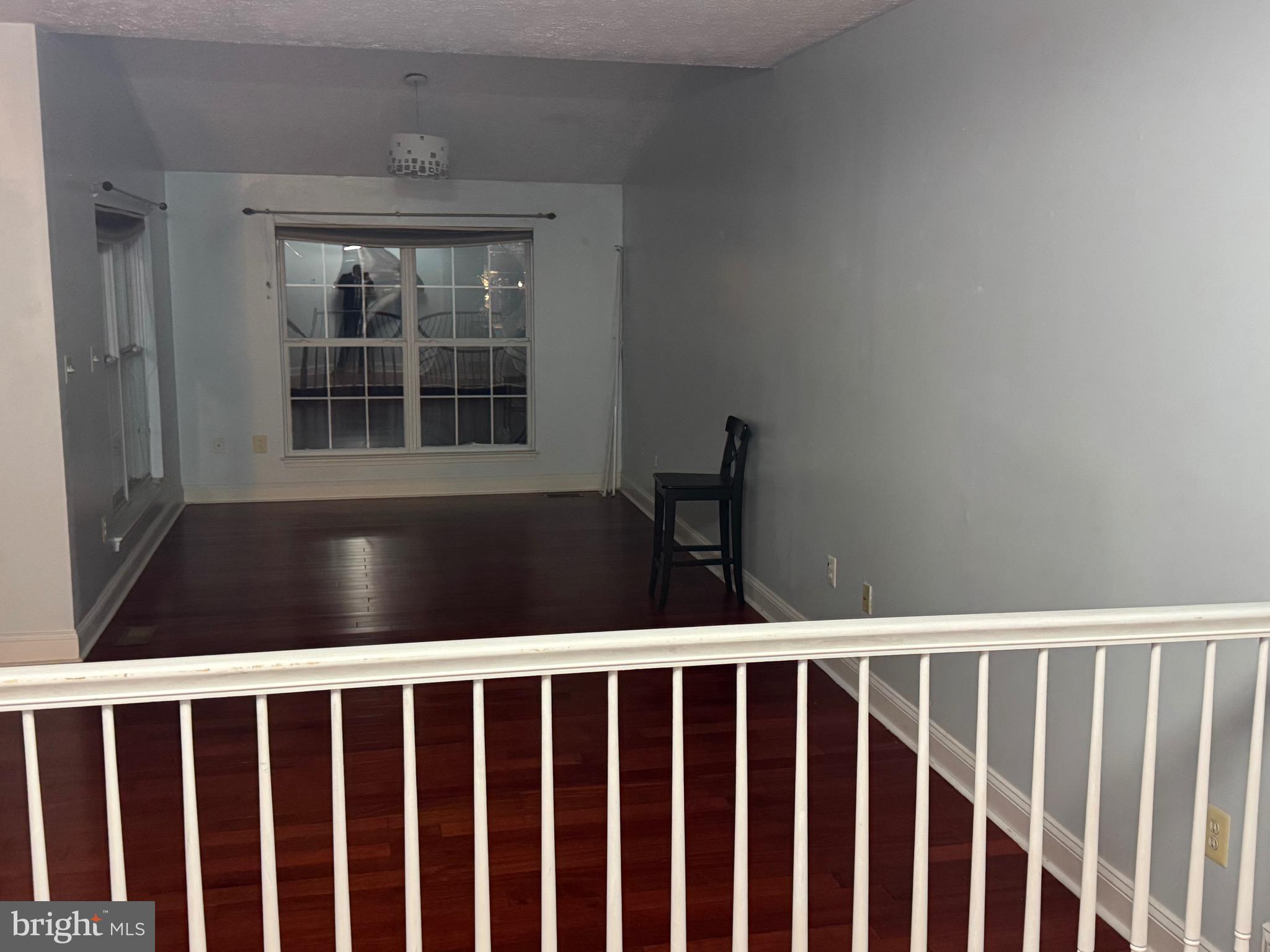 7148 Natures Road Columbia, MD 21046 - Photo 43 of 49 a view of staircase with wooden floor