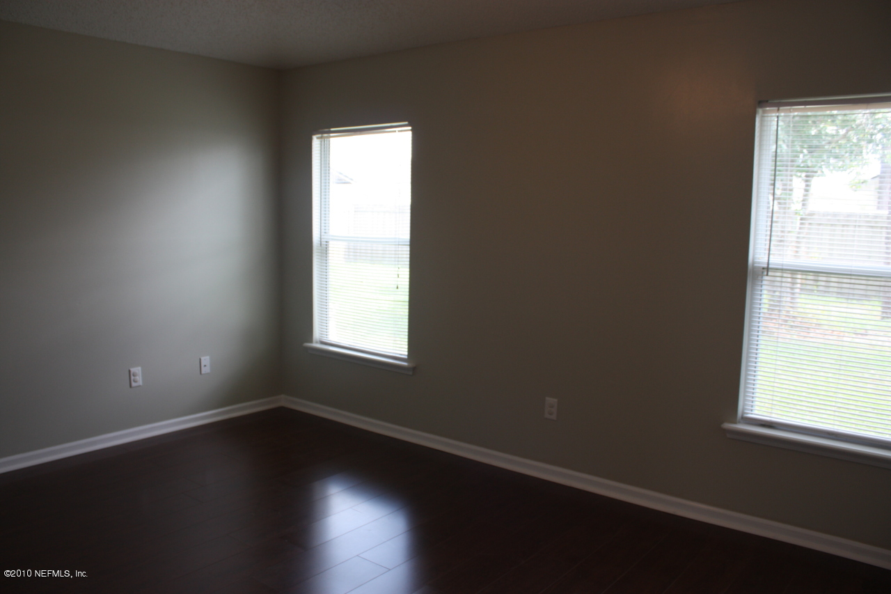 8580 Springtree Road Jacksonville, FL 32210 - Photo 16 of 22 Master Bedroom