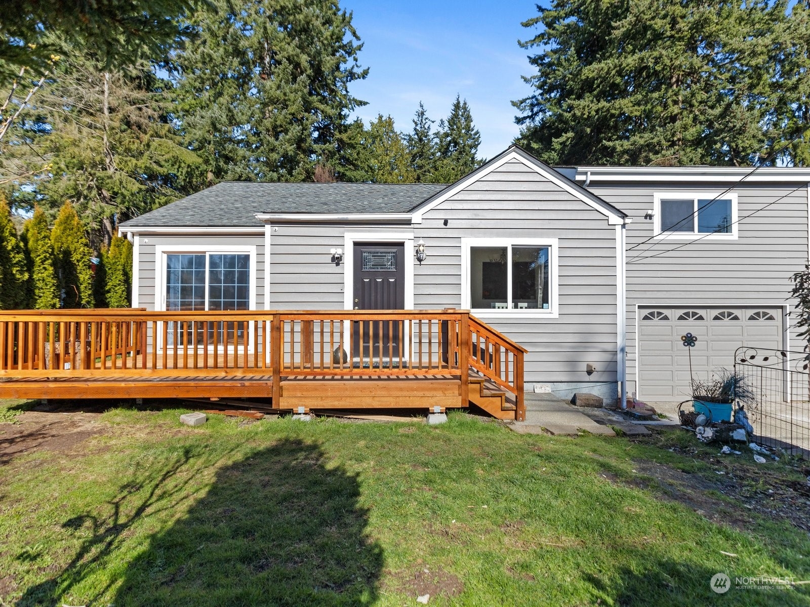 529 Cabot Road Everett, WA 98203 - Photo 1 of 40 a view of a house with a yard and deck