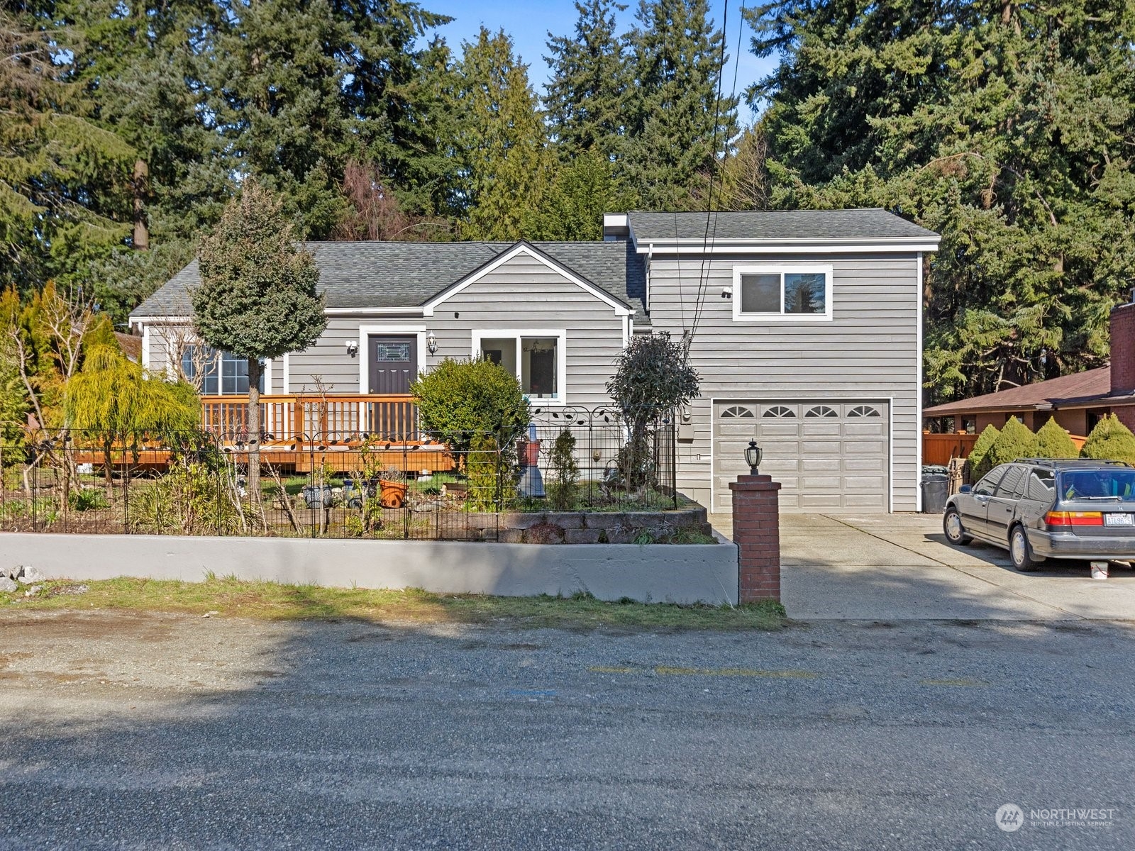 529 Cabot Road Everett, WA 98203 - Photo 33 of 40 a front view of house with yard and trees around
