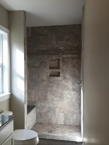 a bathroom with a toilet