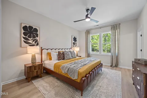 a living room with furniture rug and window