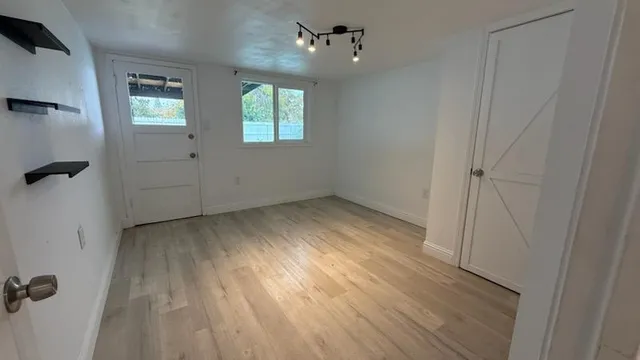 an empty room with windows