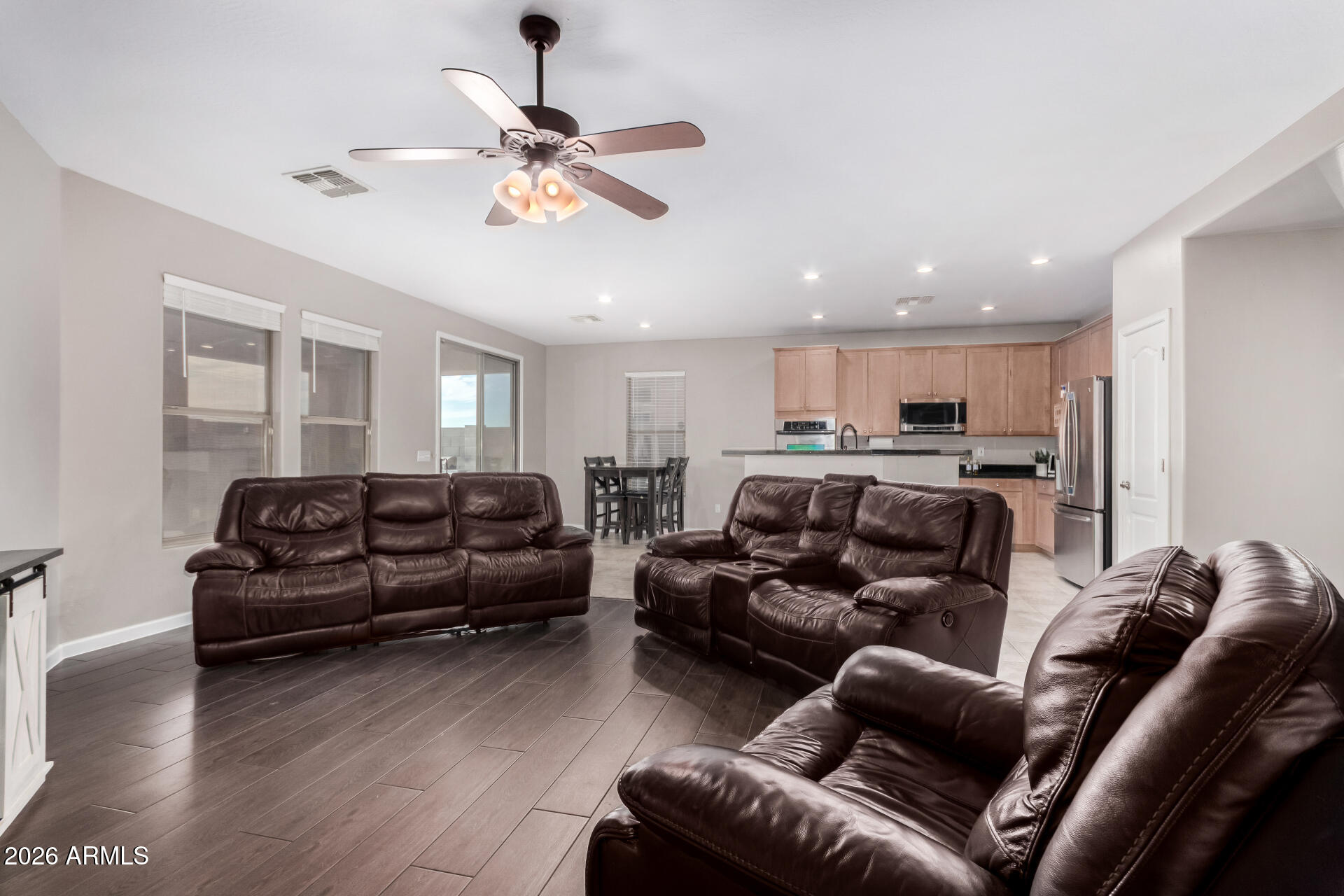 25828 North Desert Mesa Drive Surprise, AZ 85387 - Photo 10 of 37 a living room with furniture and a ceiling fan