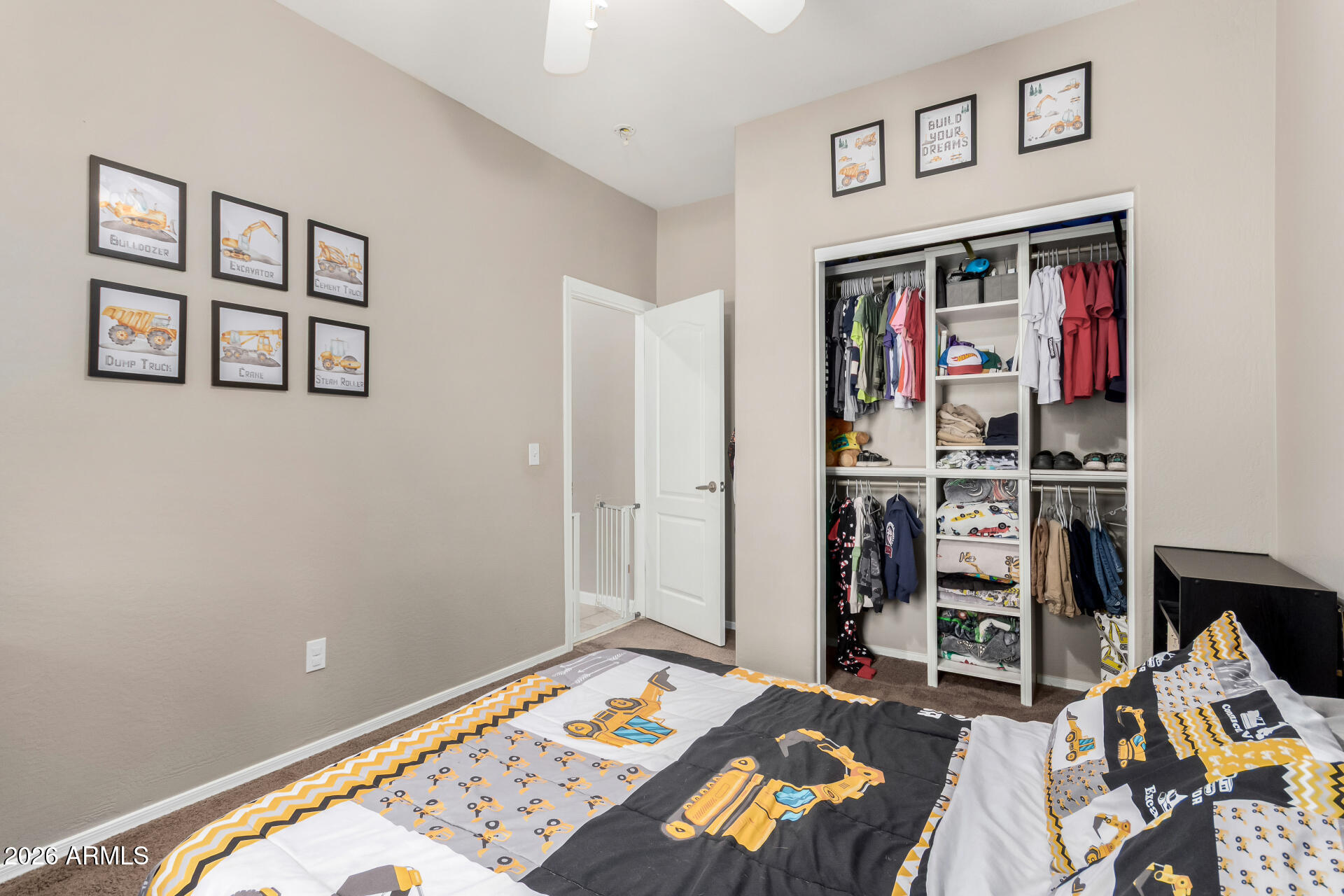 25828 North Desert Mesa Drive Surprise, AZ 85387 - Photo 25 of 37 a bed room with a bed and a desk