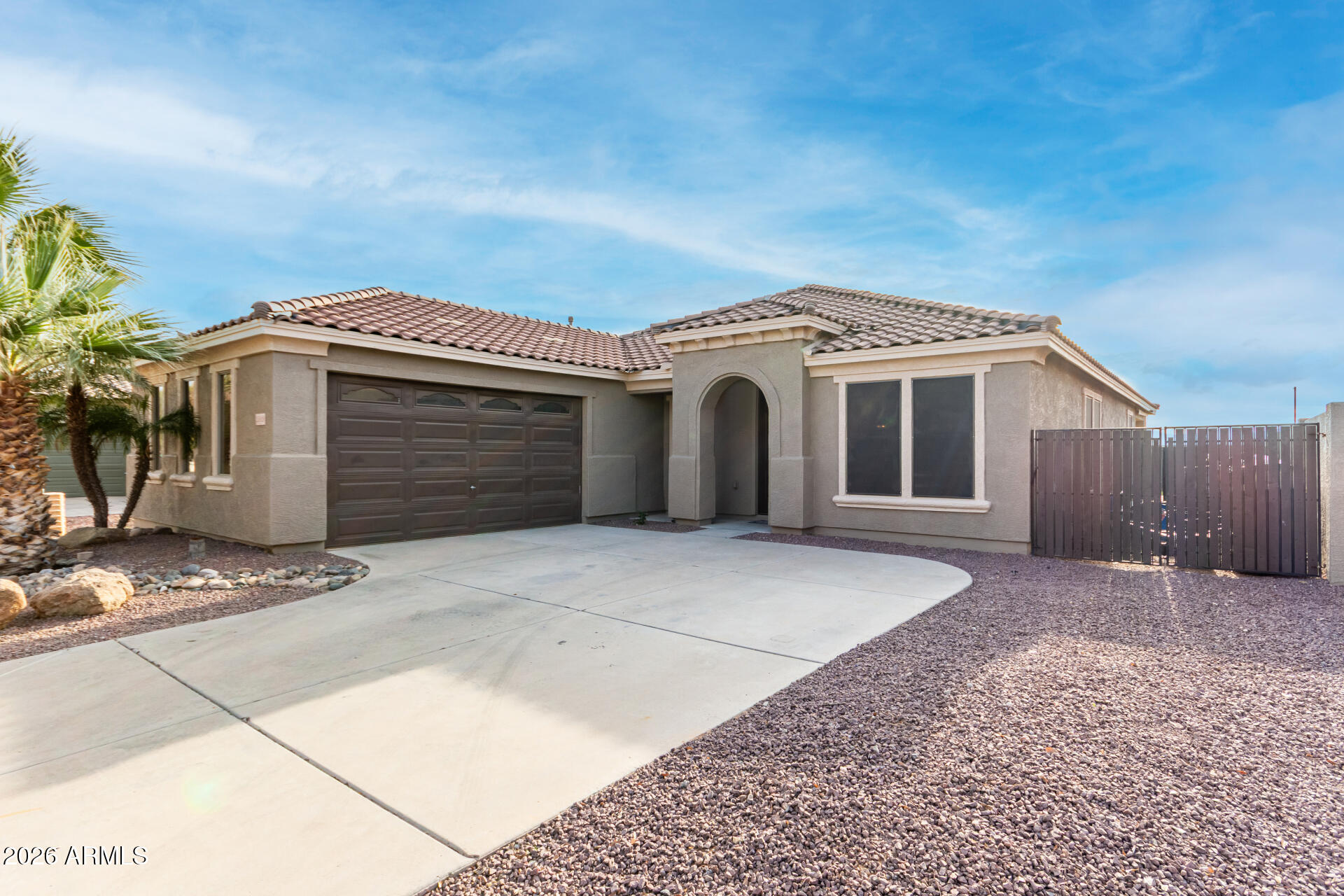 25828 North Desert Mesa Drive Surprise, AZ 85387 - Photo 2 of 37 a view of a house with a garage