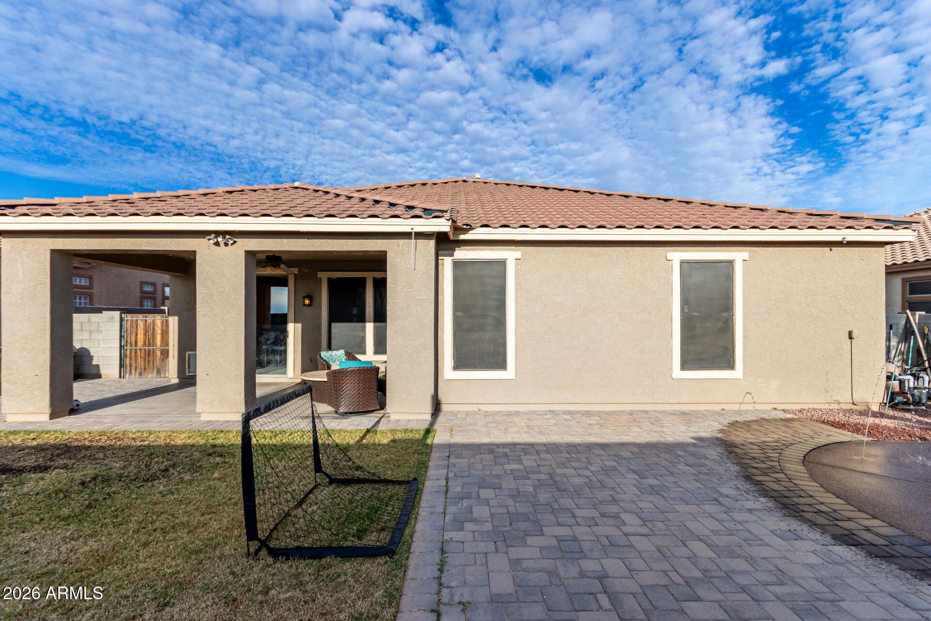 25828 North Desert Mesa Drive Surprise, AZ 85387 - Photo 32 of 37 a front view of a house with garden