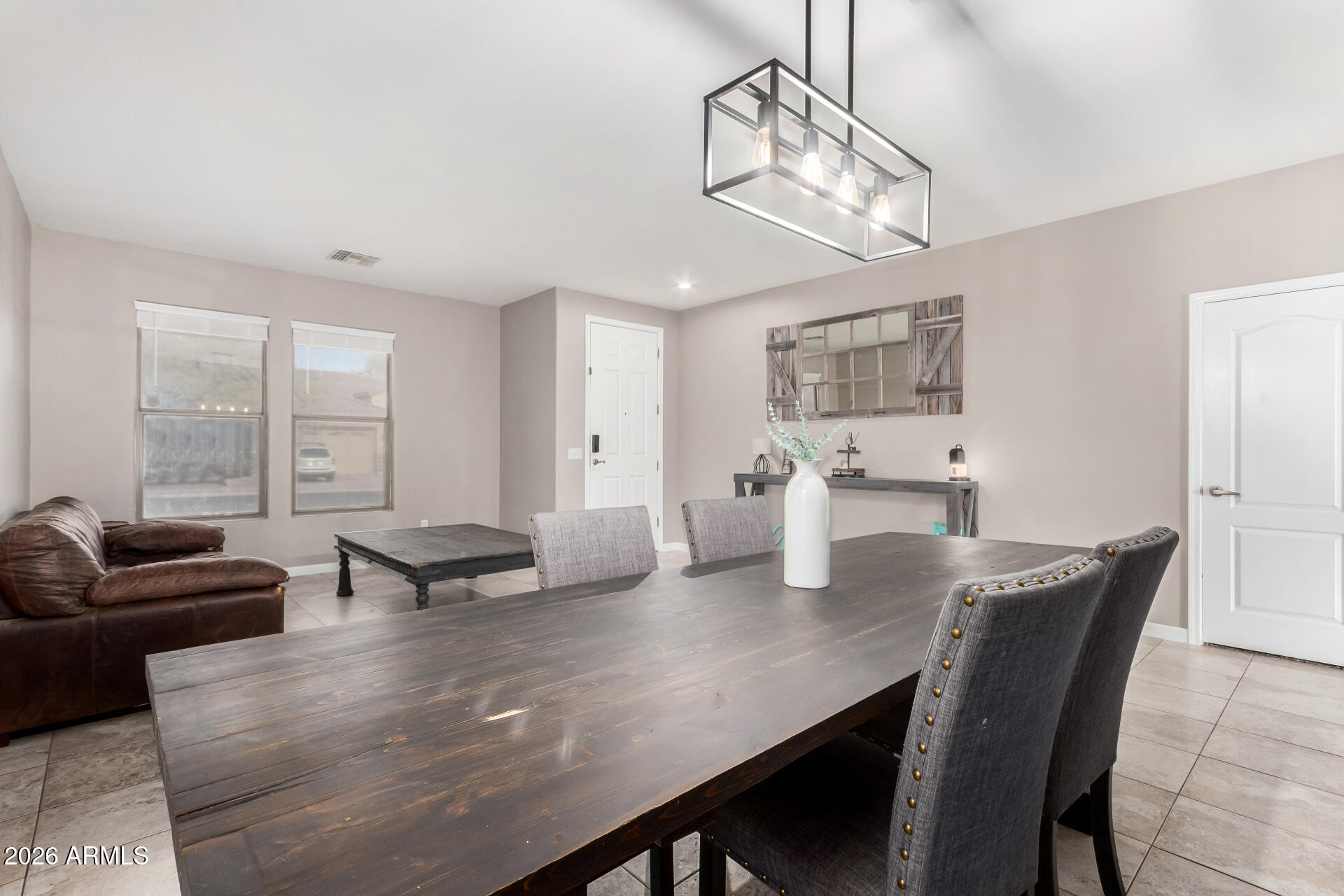25828 North Desert Mesa Drive Surprise, AZ 85387 - Photo 5 of 37 a view of a dining room with furniture window and outside view