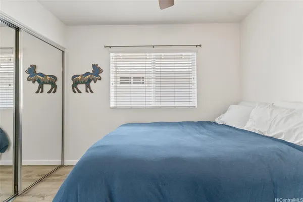 a view of a bedroom and a window