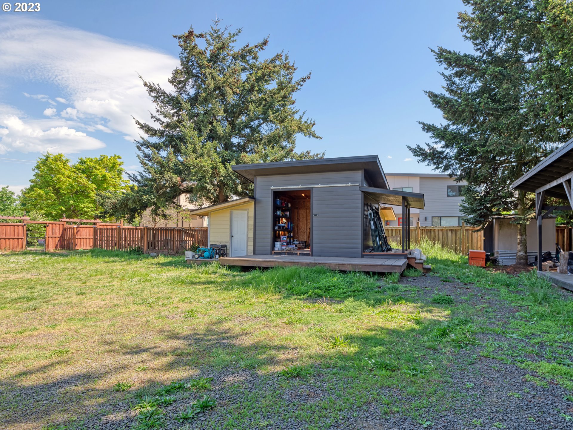 Old Coburg Road Eugene, OR 97408 - Photo 13 of 14 a backyard of a house with plants and large tree