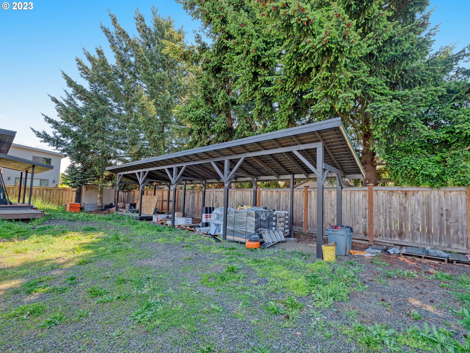 Old Coburg Road Eugene, OR 97408 - Photo 6 of 14 a view of a big house with a big yard and large trees