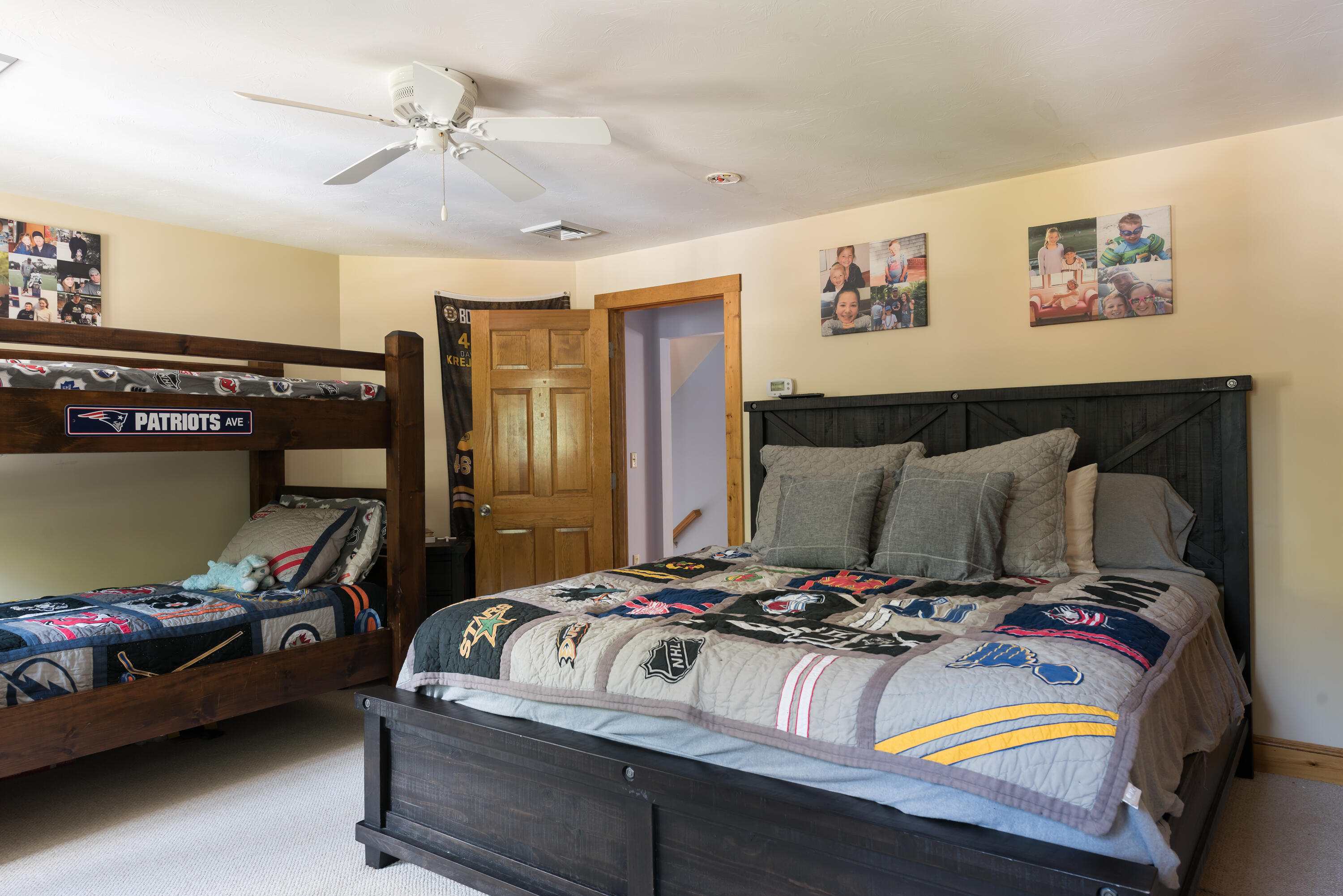 125 Lakeview Drive Centerville, MA 02632 - Photo 15 of 28 a bedroom with a bed and wooden floor