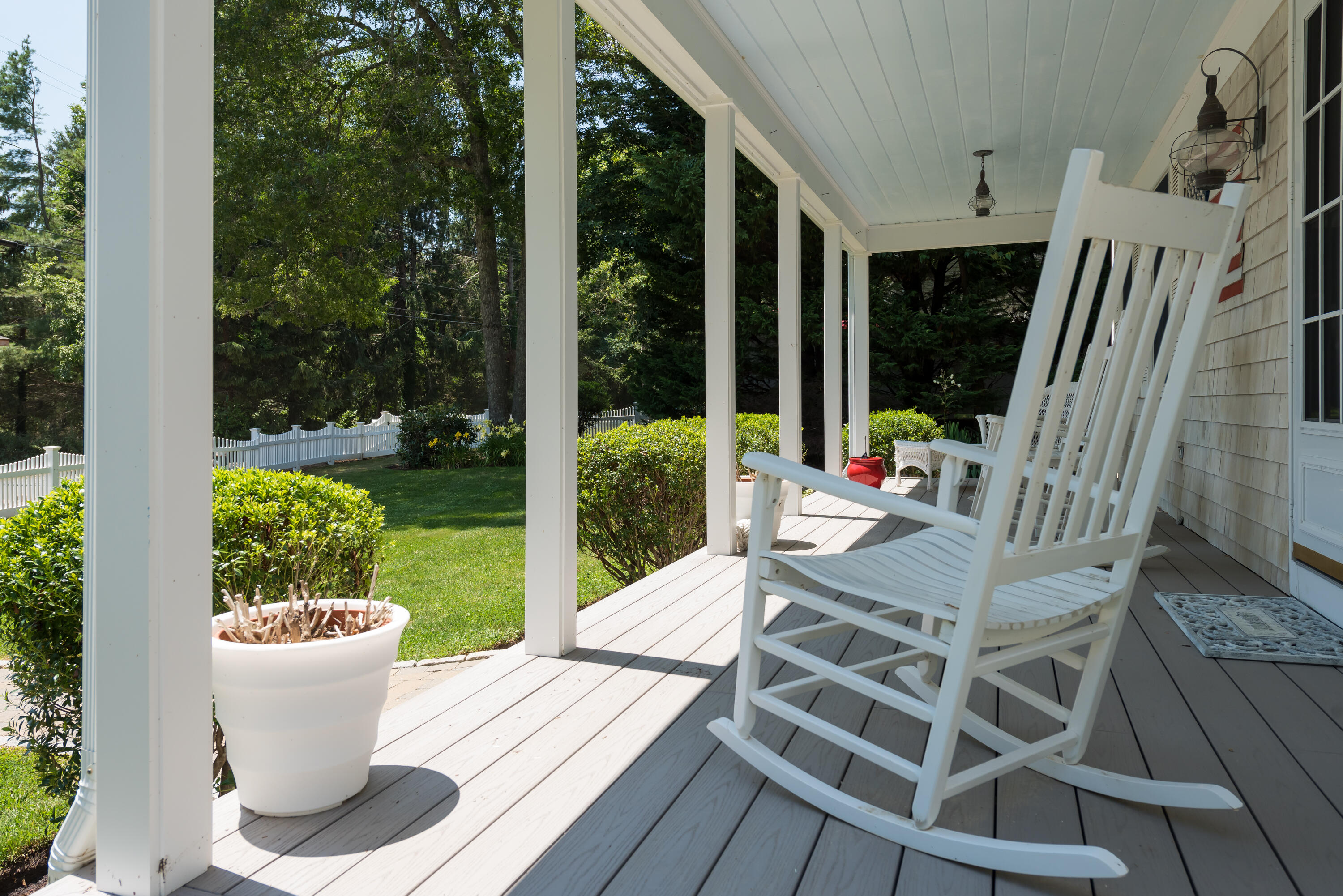 125 Lakeview Drive Centerville, MA 02632 - Photo 22 of 28 a view of a patio with furniture and garden