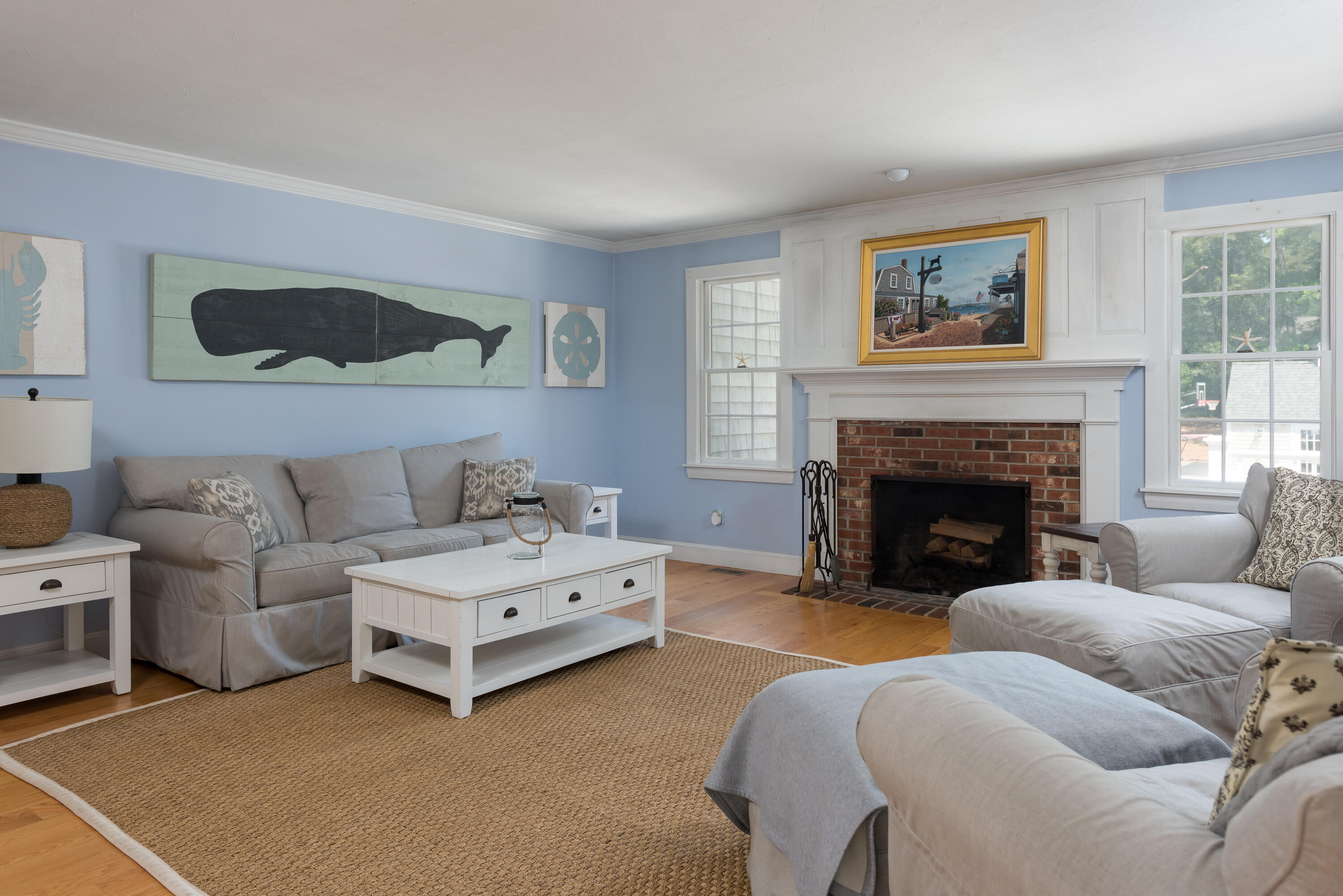 125 Lakeview Drive Centerville, MA 02632 - Photo 5 of 28 a living room with furniture and a fireplace