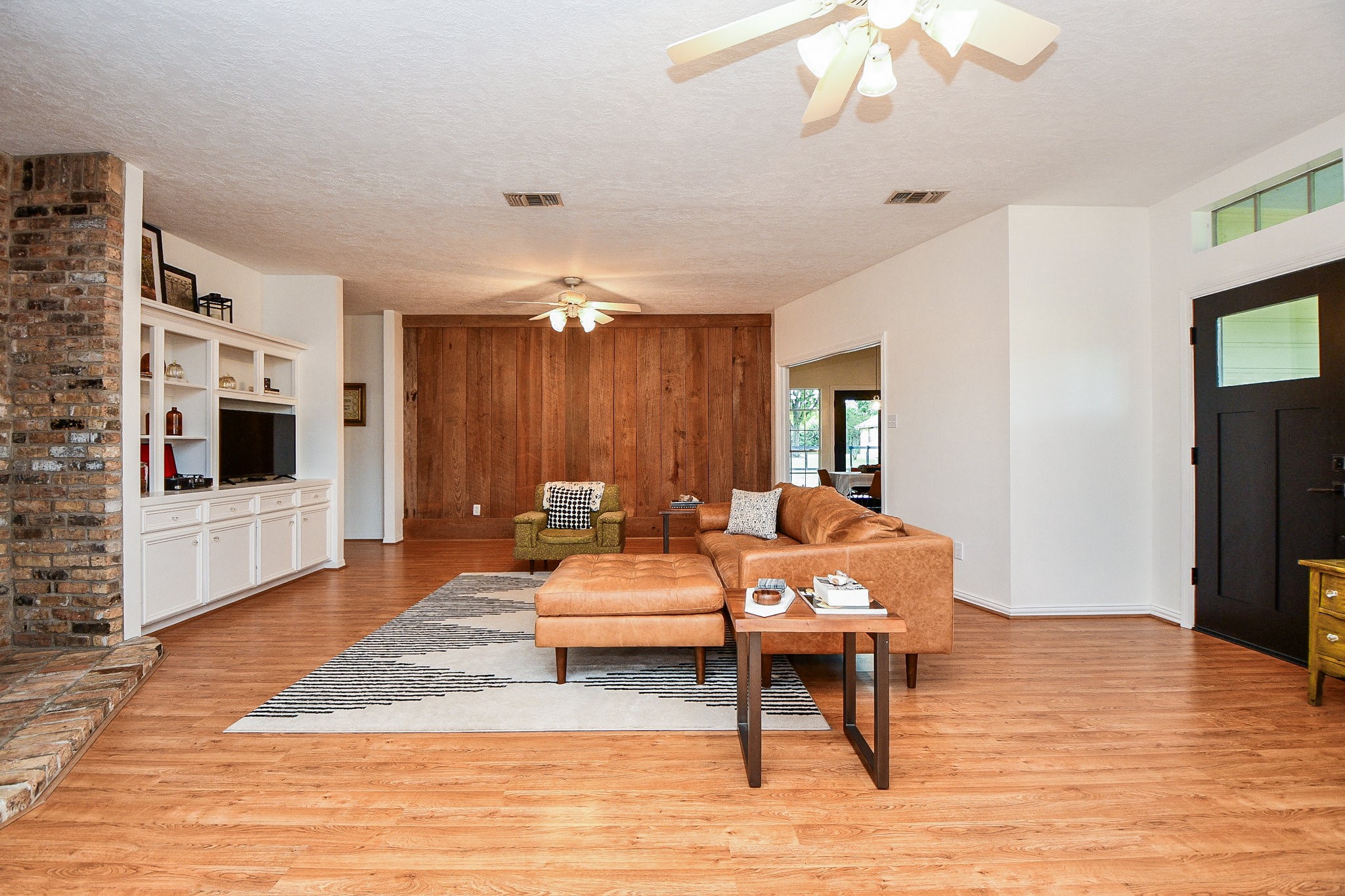 22035 Buescher Road Tomball, TX 77377 - Photo 14 of 43 a living room with furniture and a flat screen tv