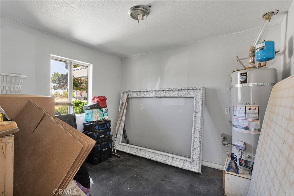 10325 Sheep Creek Road Phelan, CA 92371 - Photo 33 of 47 a room with furniture and a window