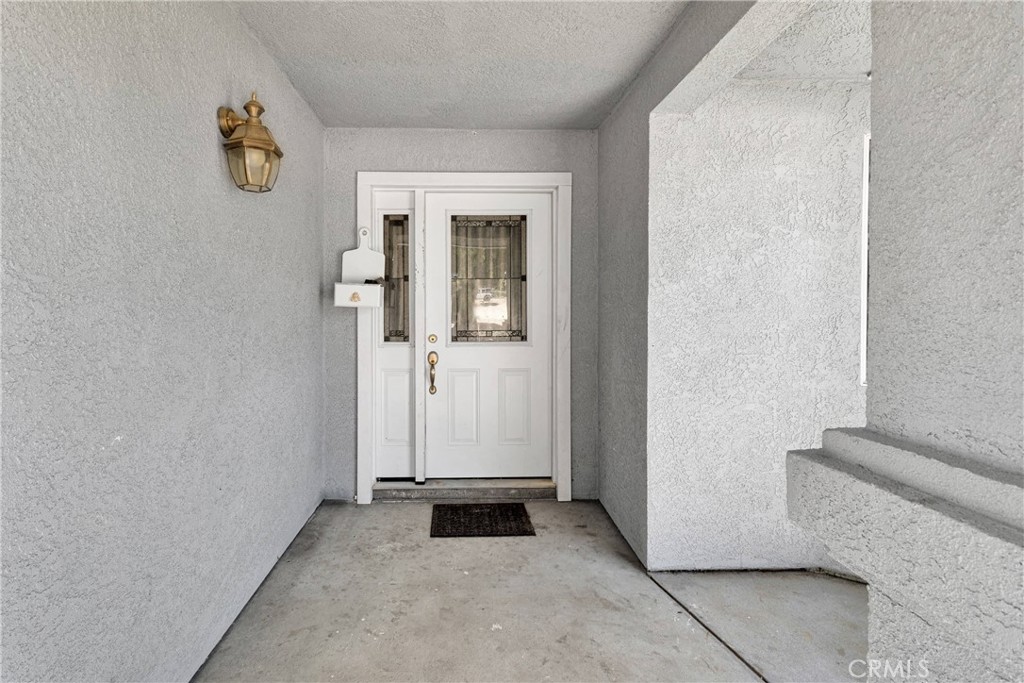 10325 Sheep Creek Road Phelan, CA 92371 - Photo 5 of 47 a view of a hallway with windows