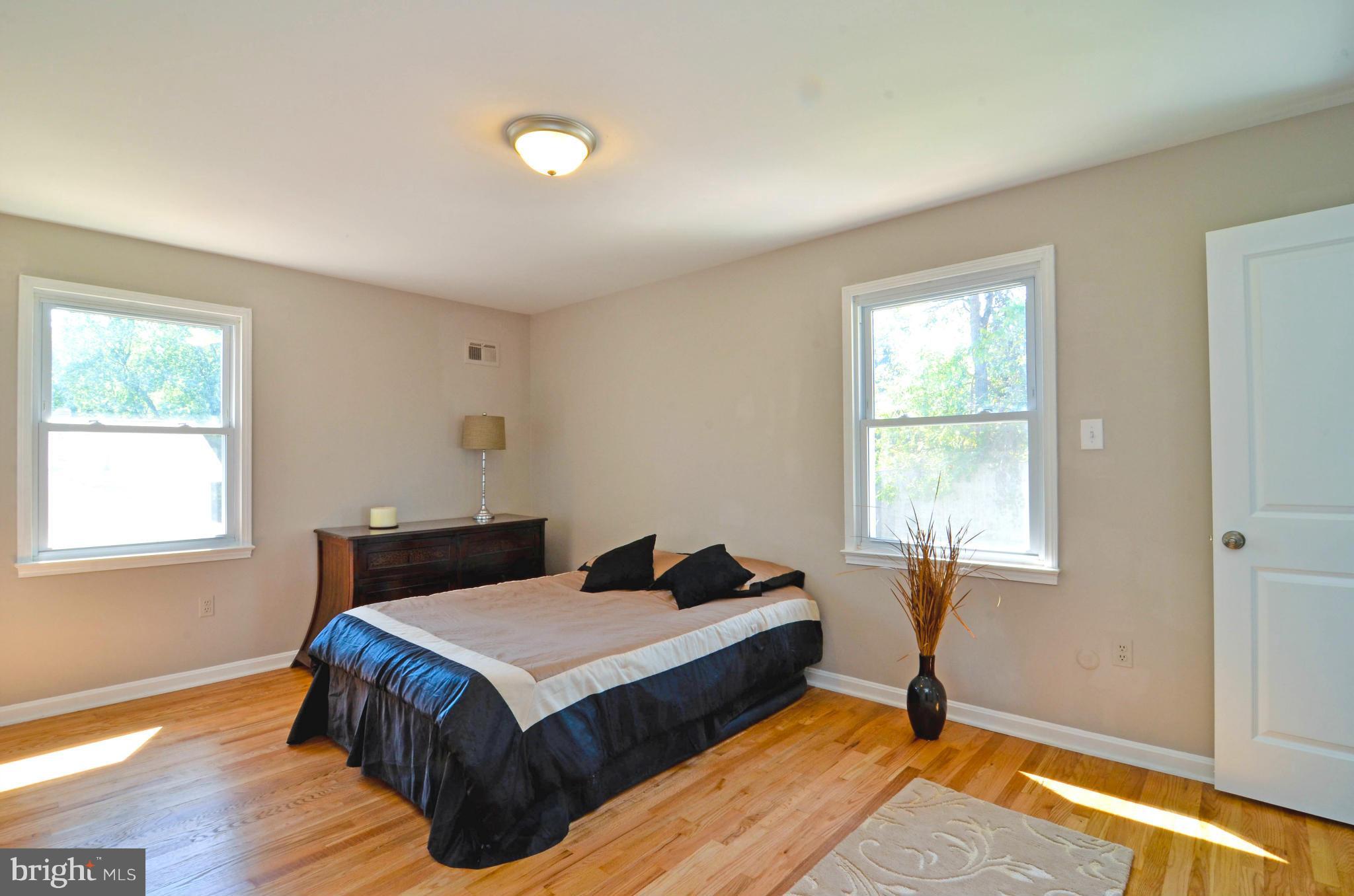 13310 Tamarack Road Silver Spring, MD 20904 - Photo 14 of 30 a bedroom with a bed and window