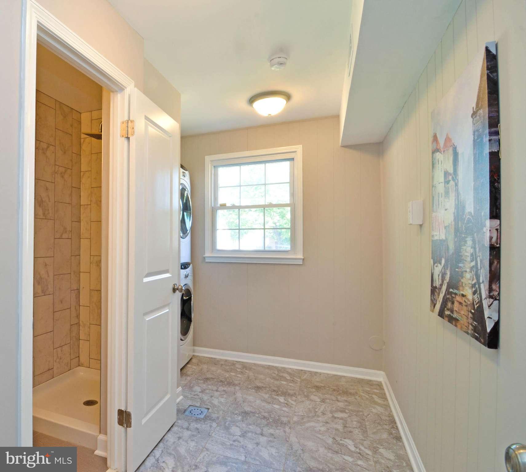 13310 Tamarack Road Silver Spring, MD 20904 - Photo 23 of 30 a view of hallway with a bathroom and a shower