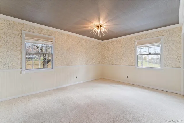 a kitchen with stainless steel appliances granite countertop a stove top oven a sink dishwasher a refrigerator and cabinets with wooden floor