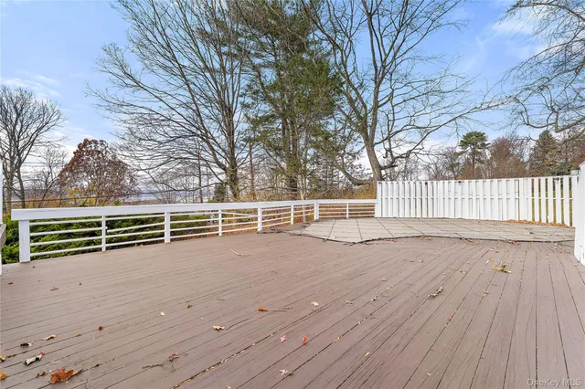 a view of a deck patio and outdoor seating