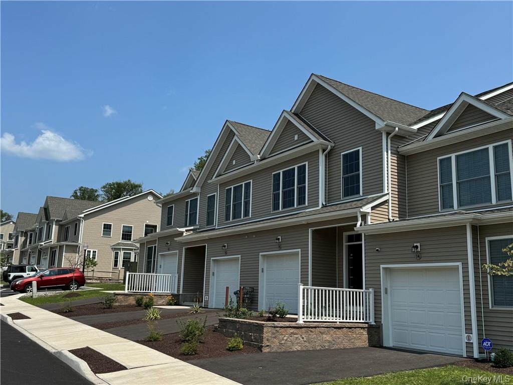 Multi unit property featuring a garage