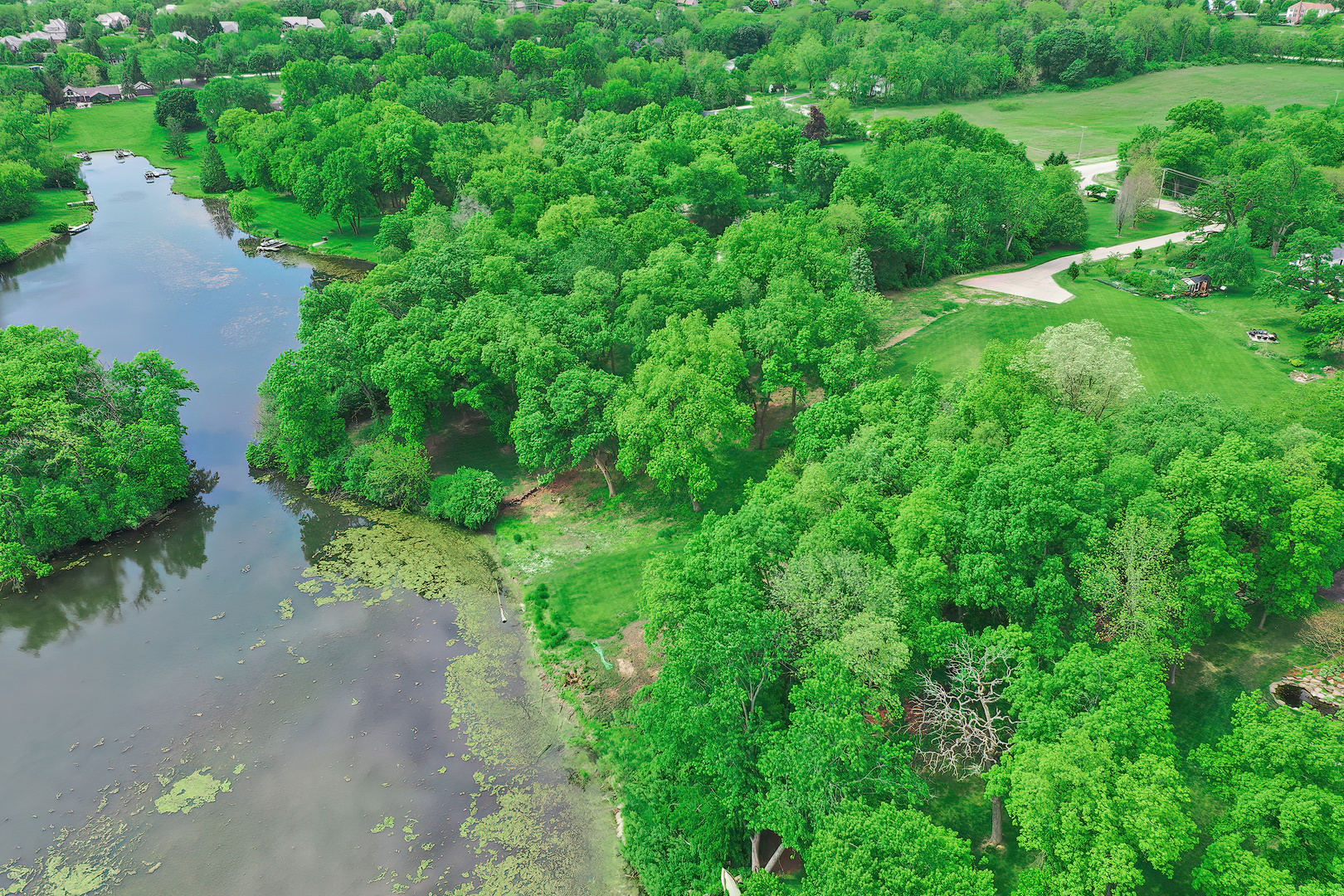 26813 North Chevy Chase Road Mundelein, IL 60060 - Photo 13 of 15 a view of a street view with a yard