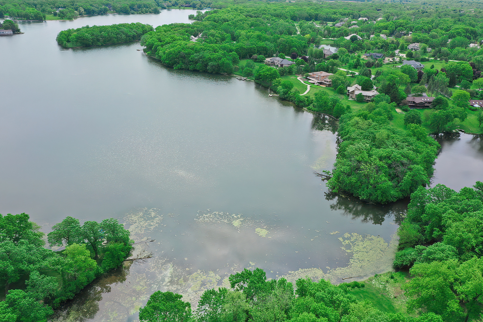 26813 North Chevy Chase Road Mundelein, IL 60060 - Photo 14 of 15 an aerial view of a house with a yard and lake view