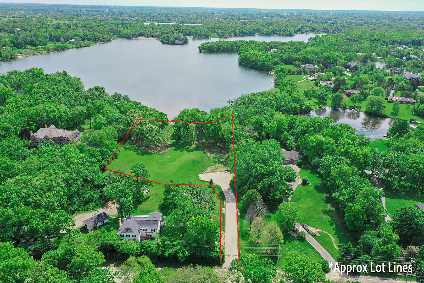26813 North Chevy Chase Road Mundelein, IL 60060 - Photo 7 of 15 an aerial view of a house with outdoor space and lake view
