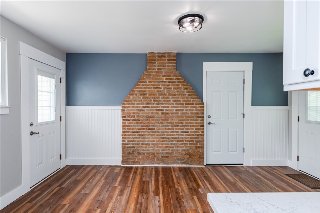 1217 Jasper Road Xenia, OH 45385 - Photo 26 of 62 This inviting space features a charming exposed brick accent wall, adding character and warmth.