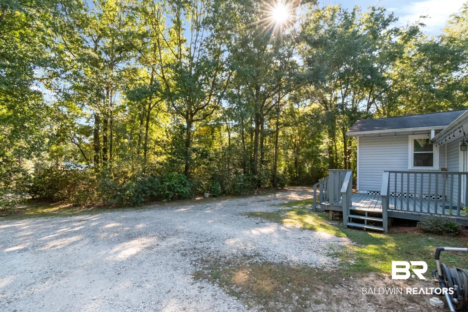 1321 Rainbow Drive West Mobile, AL 36693 - Photo 43 of 48 View of yard featuring a deck