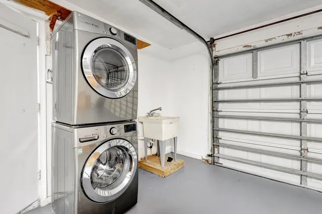 a view of a storage & utility room with washer and dryer