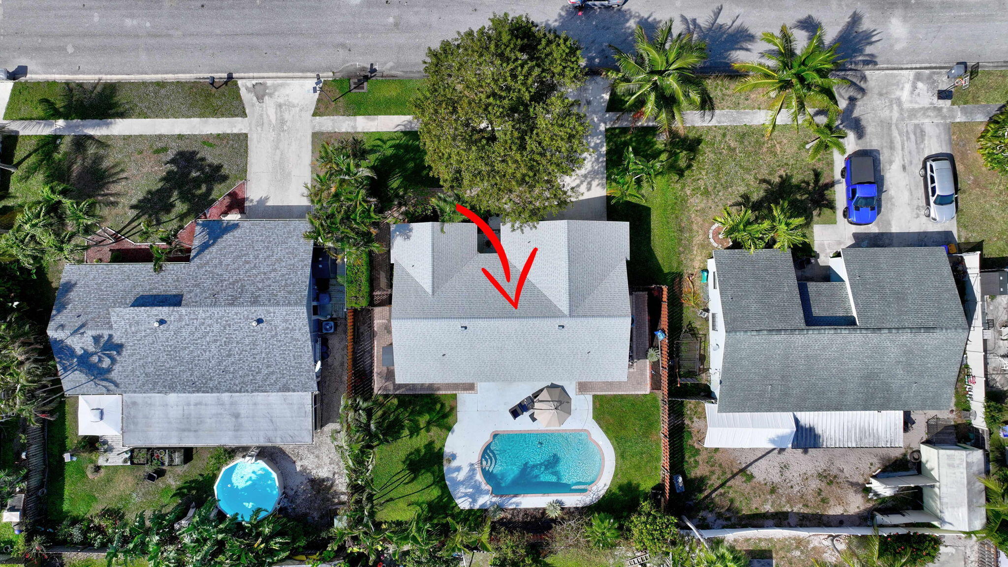 9404 Longmeadow Circle Boynton Beach, FL 33436 - Photo 27 of 28 a aerial view of a house with table and chairs in patio
