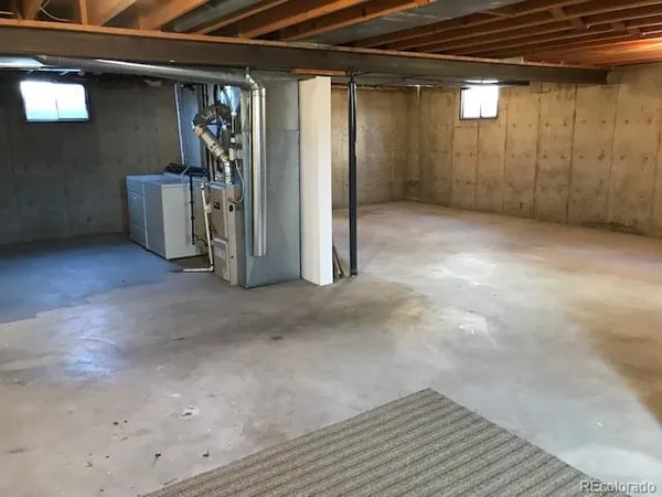 a view of a backyard of the house