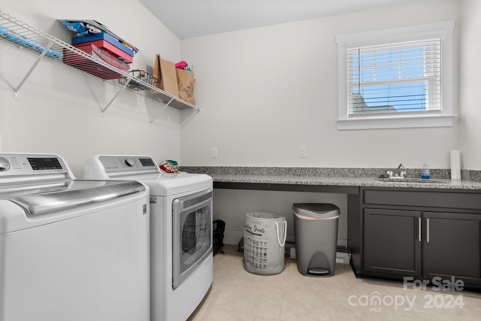 815 Bluff Loop Road Rock Hill, SC 29730 - Photo 19 of 35 a utility room with dryer and washer