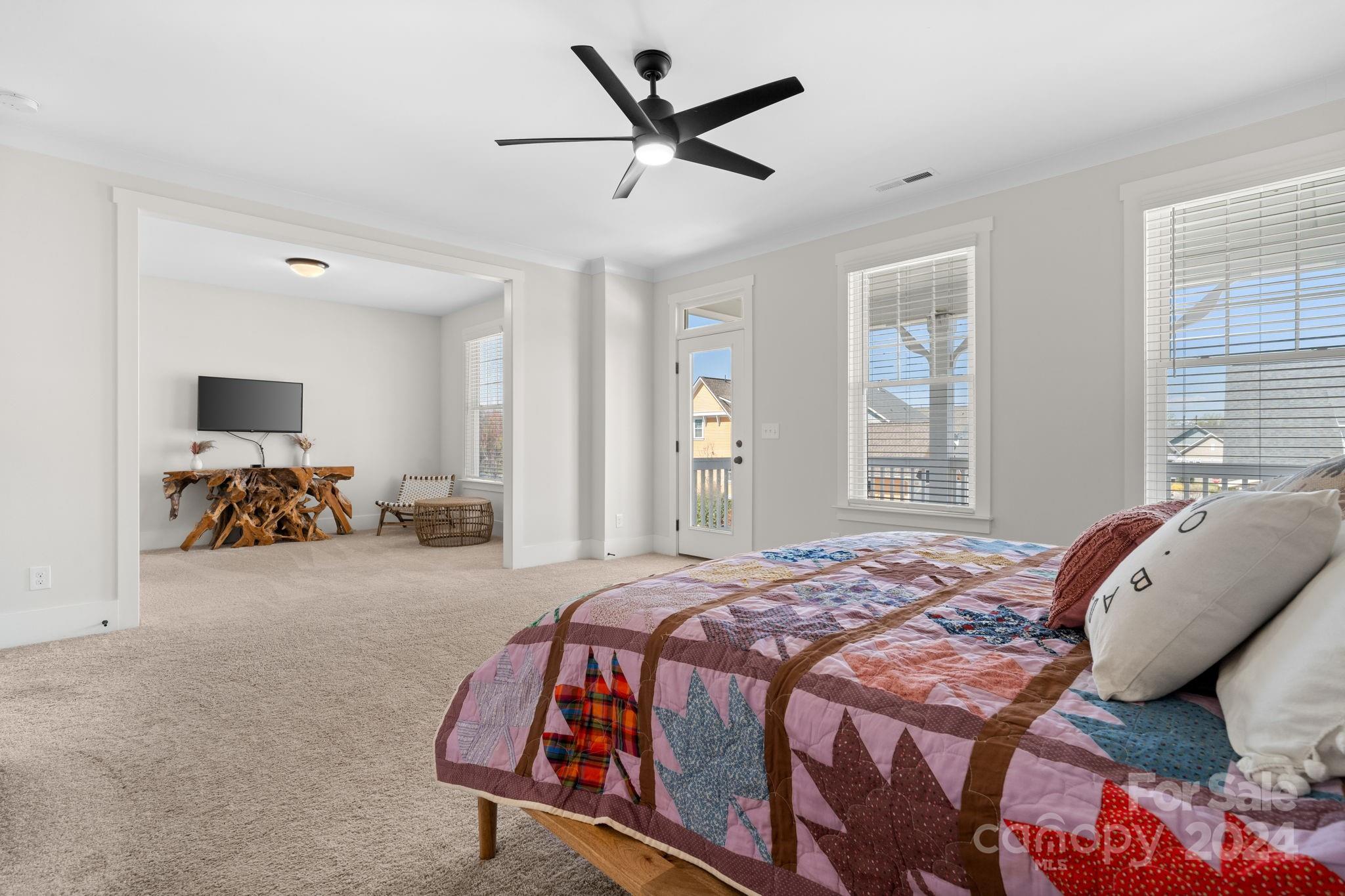 815 Bluff Loop Road Rock Hill, SC 29730 - Photo 21 of 35 a bedroom with a bed and ceiling fan