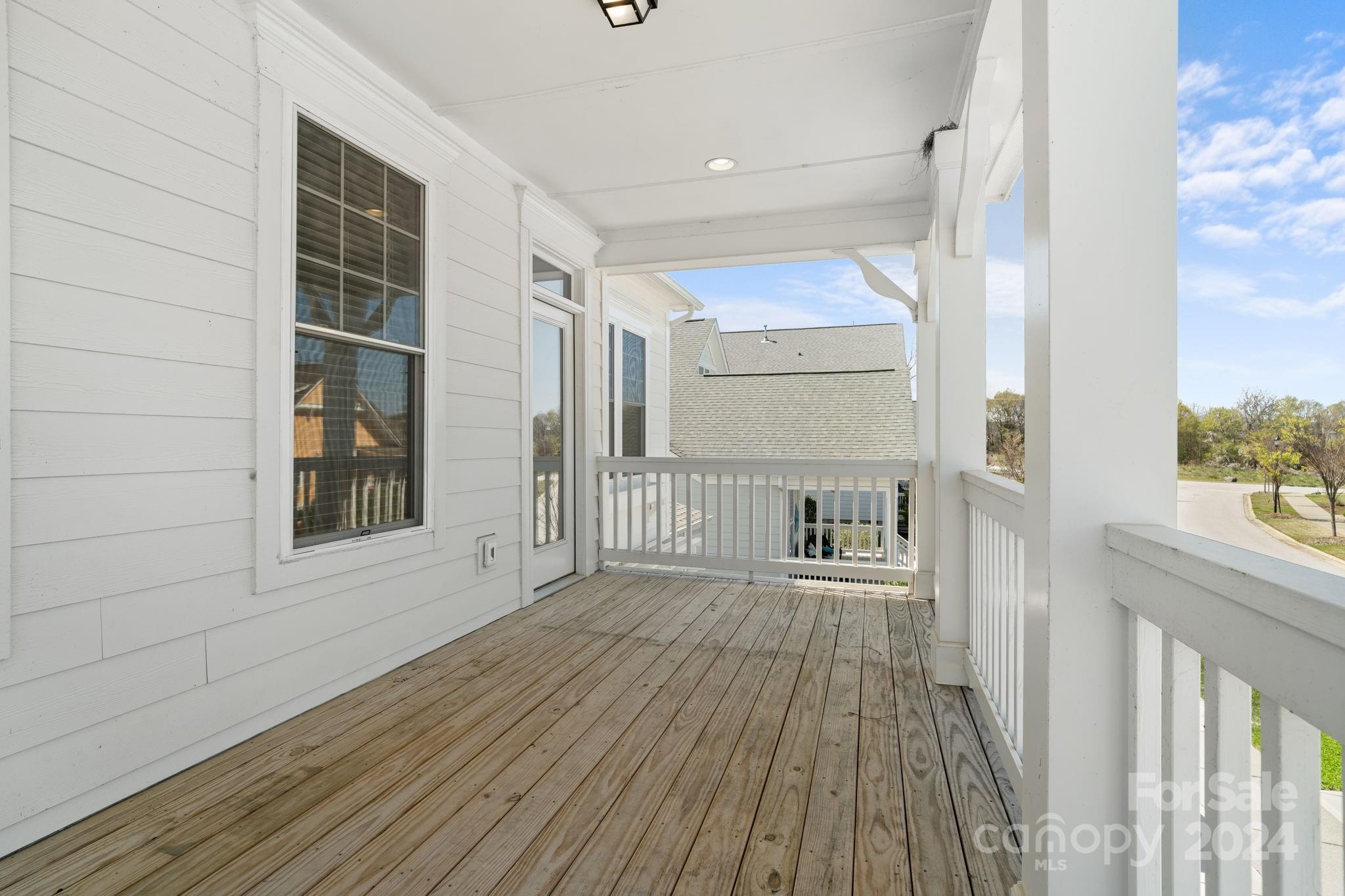 815 Bluff Loop Road Rock Hill, SC 29730 - Photo 24 of 35 a view of a balcony with wooden floor and fence