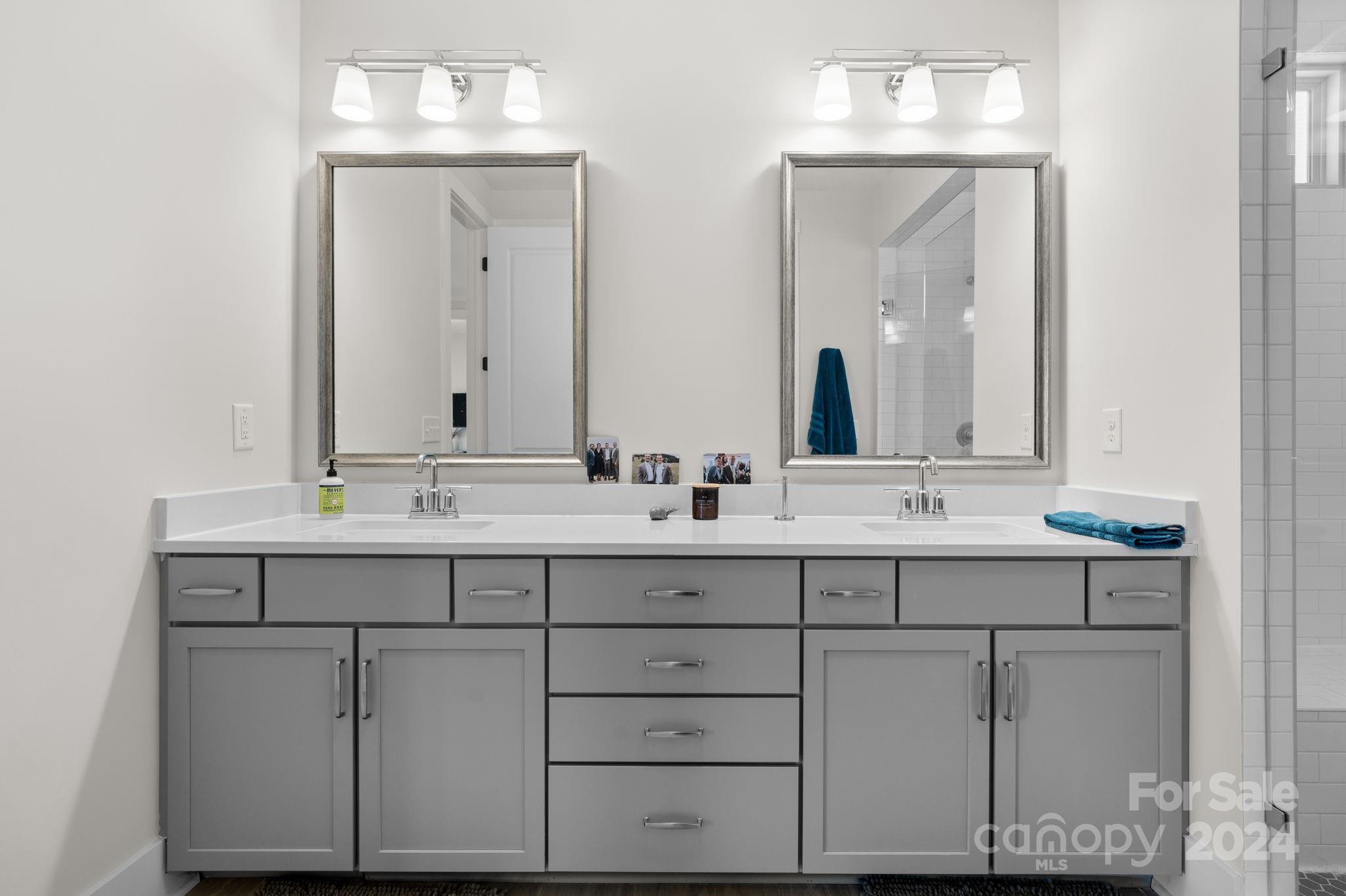 815 Bluff Loop Road Rock Hill, SC 29730 - Photo 27 of 35 a bathroom with double sink and a mirror