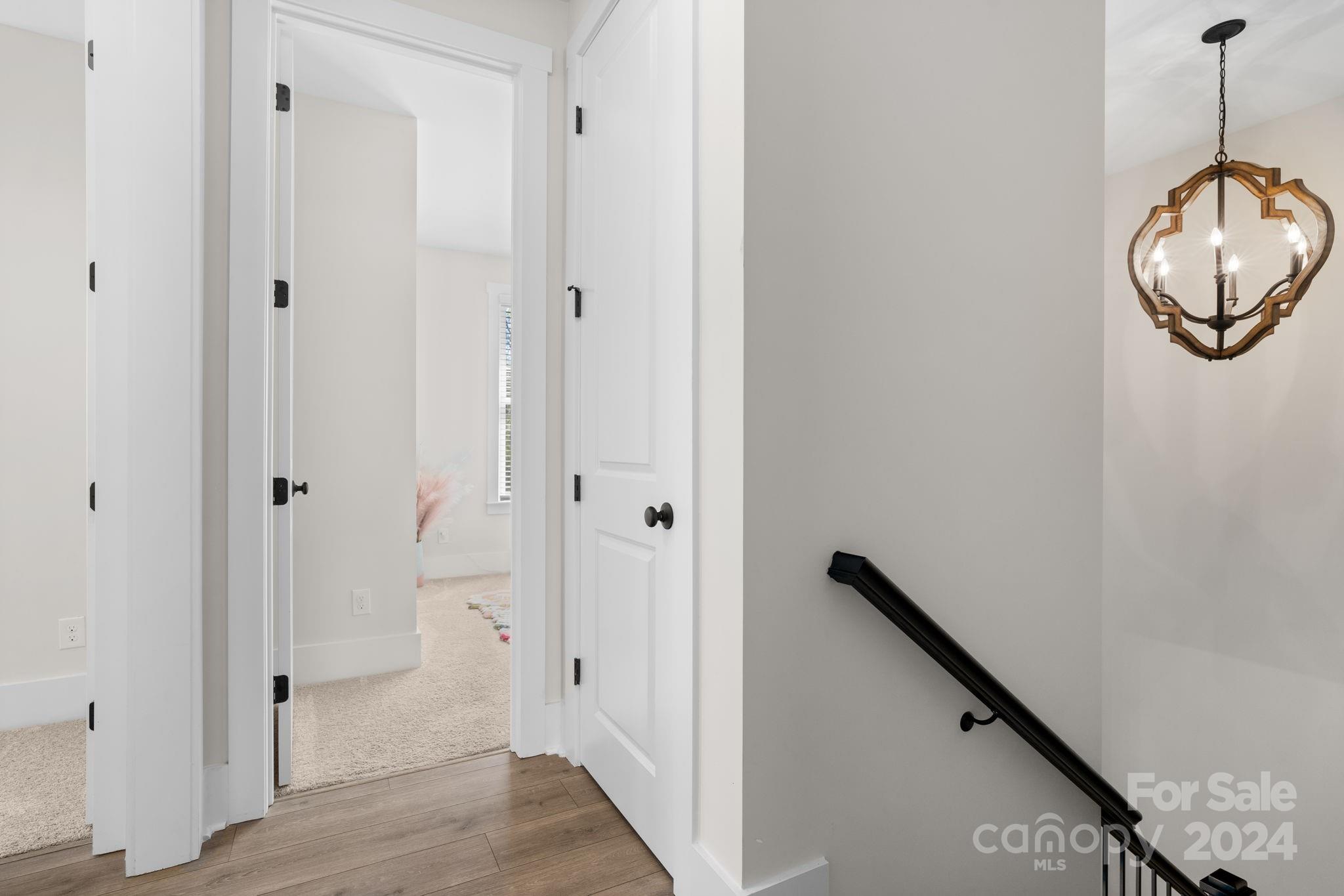 815 Bluff Loop Road Rock Hill, SC 29730 - Photo 29 of 35 a view of a room with wooden floor and mirror