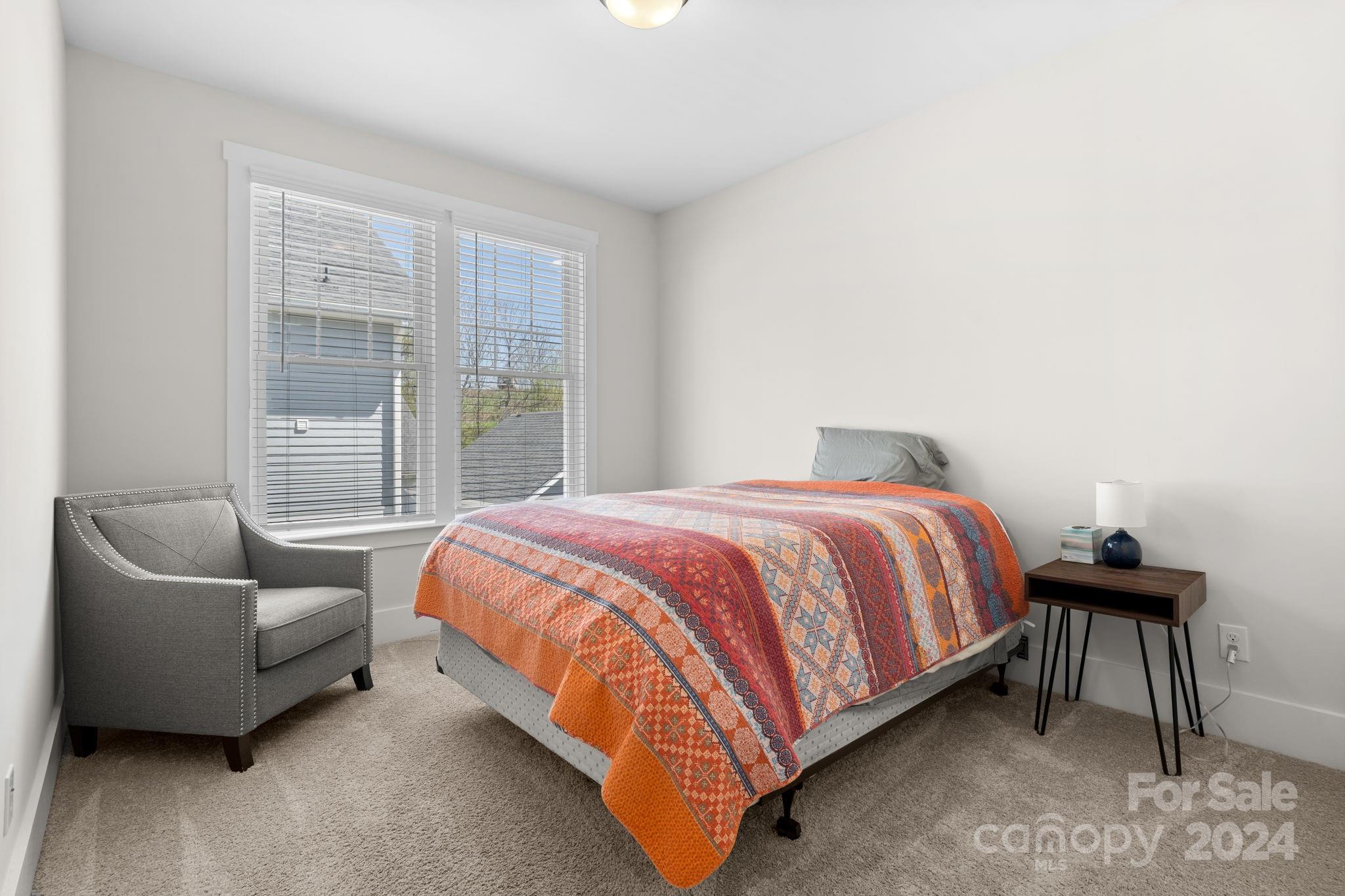 815 Bluff Loop Road Rock Hill, SC 29730 - Photo 31 of 35 a bedroom with a bed and a couch
