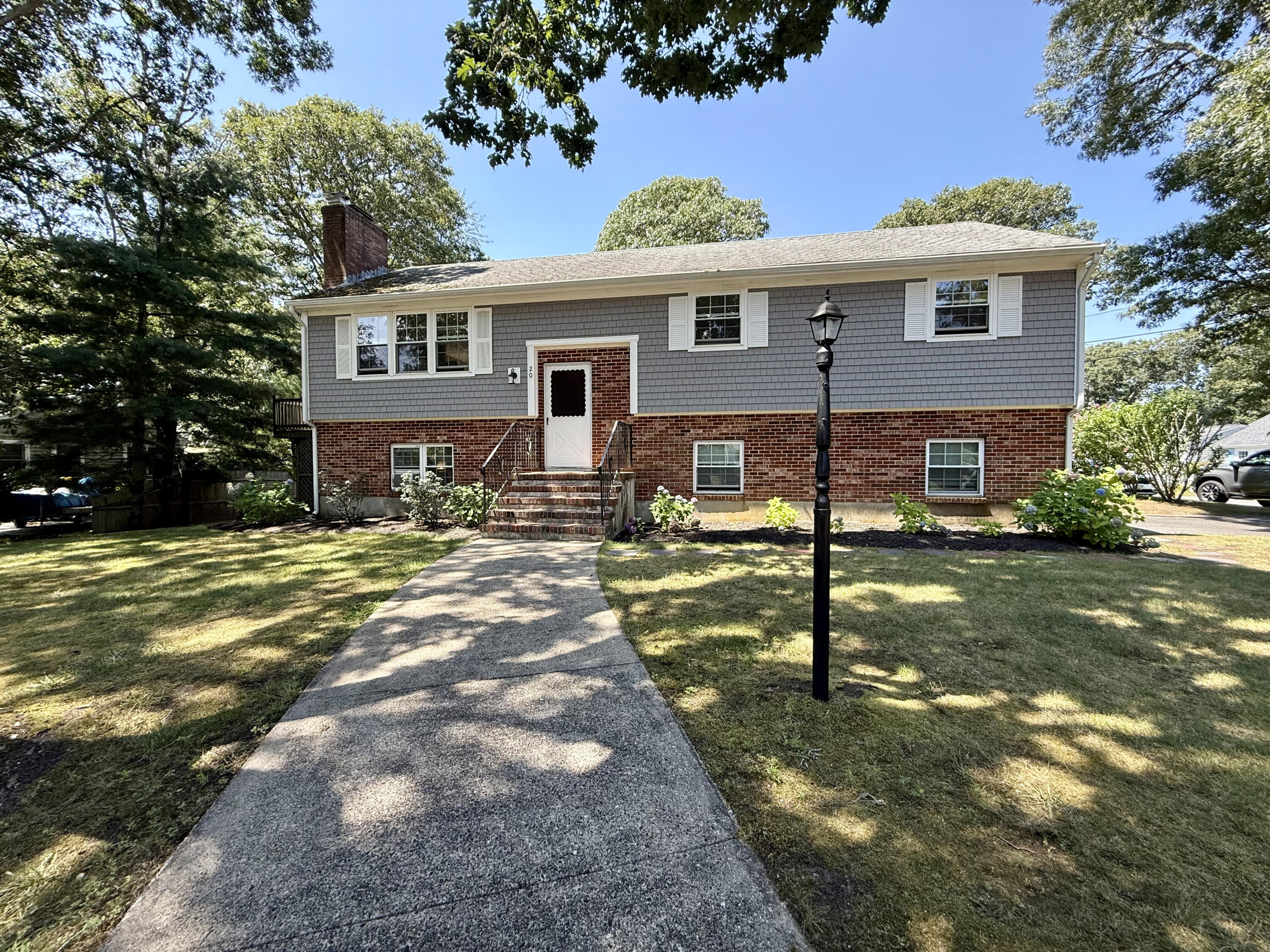 20 Trumet Road West Harwich, MA 02671 - Photo 1 of 21 a view of a house with a yard