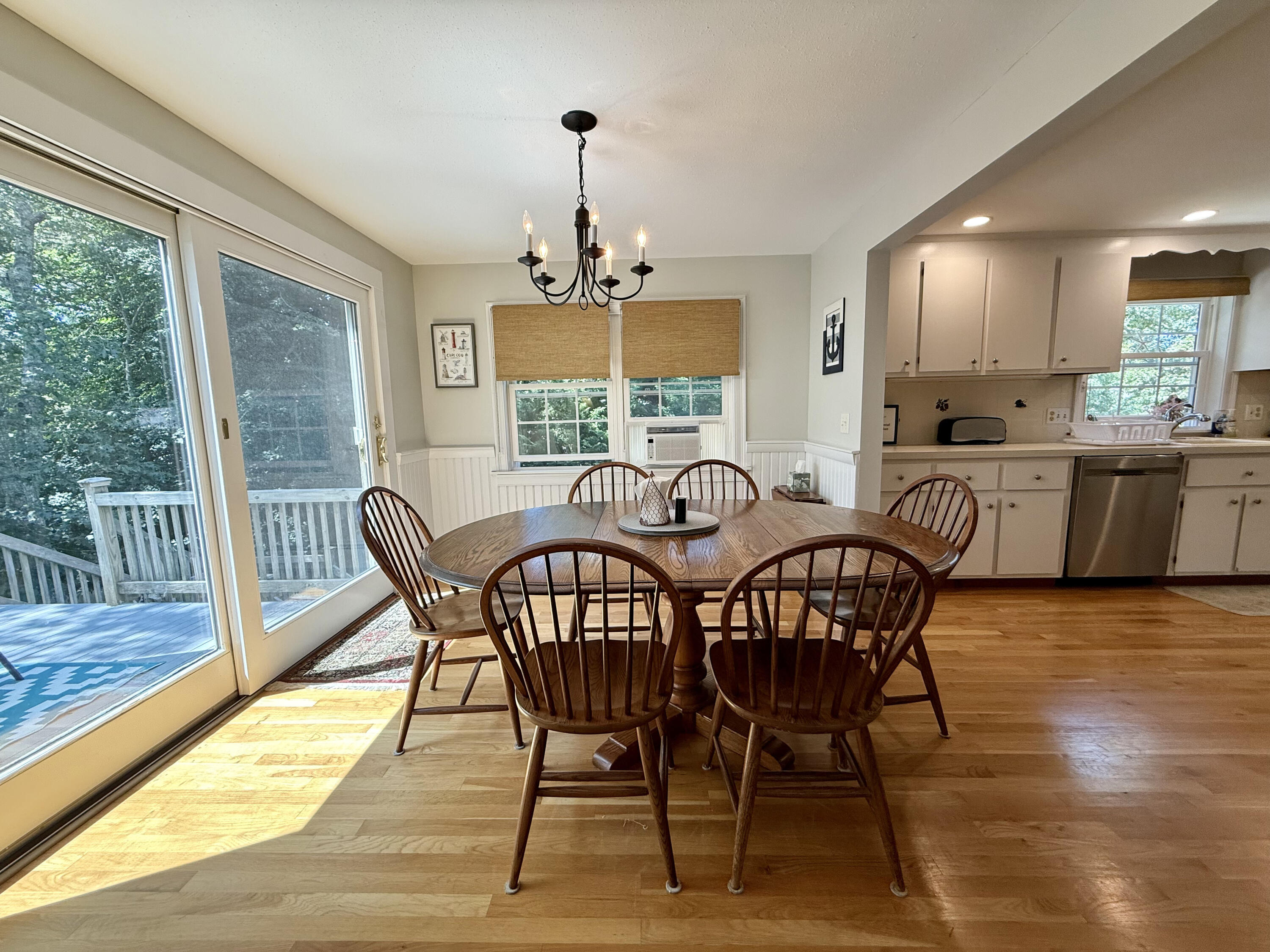 20 Trumet Road West Harwich, MA 02671 - Photo 13 of 21 a view of a dining room with furniture window and wooden floor