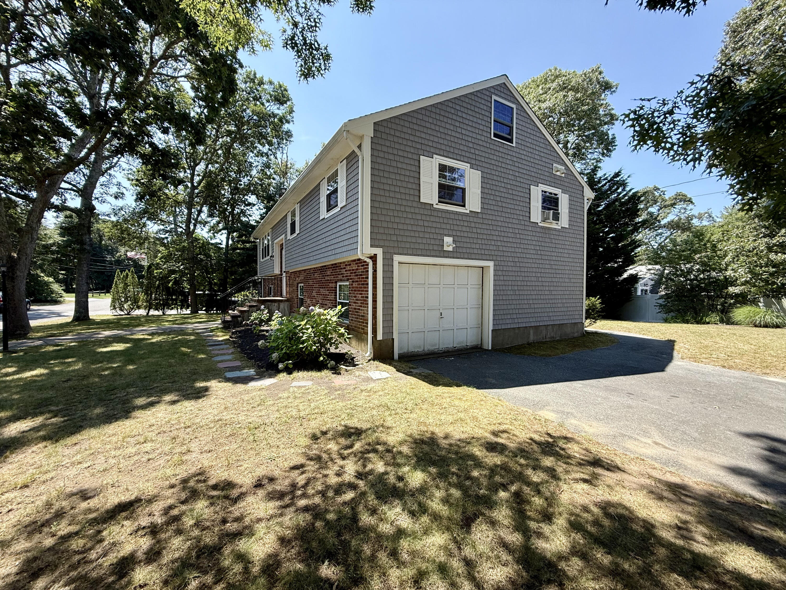 20 Trumet Road West Harwich, MA 02671 - Photo 3 of 21 a front view of house with yard
