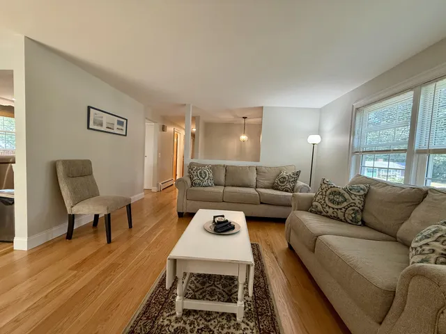 a living room with furniture and a couch