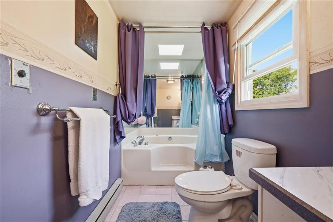 74 Swiss View Road Lehighton, PA 18235 - Photo 41 of 59 Natural light from a classic window illuminates this bathroom featuring a large soaking tub.
