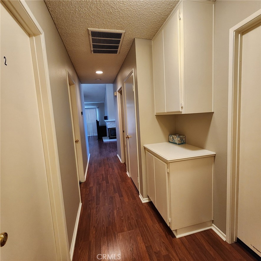 29806 Coral Tree Court Menifee, CA 92584 - Photo 25 of 29 a view of hallway with wooden floor