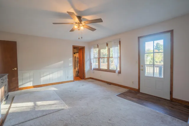 a bathroom with a tub and shower