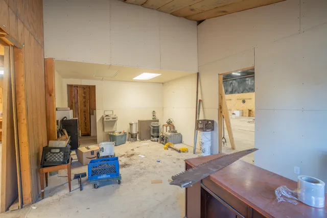 a view of a storage room with furniture