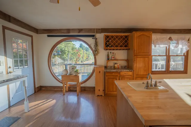a view of a swimming pool with a lounge chair